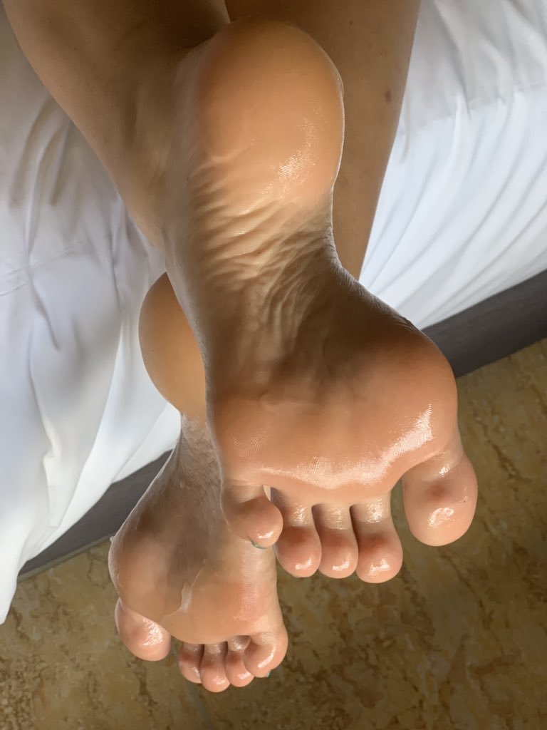 Jerking pale high arched feet